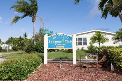 Enjoy peaceful water views and your own Mango Tree from this on Savanna Golf Club in Florida - for sale on GolfHomes.com, golf home, golf lot
