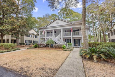Located within Weehawka Woods in Pawleys Plantation, this condo on Pawleys Plantation Golf and Country Club in South Carolina - for sale on GolfHomes.com, golf home, golf lot