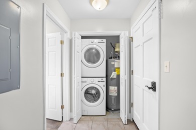 Located within Weehawka Woods in Pawleys Plantation, this condo on Pawleys Plantation Golf and Country Club in South Carolina - for sale on GolfHomes.com, golf home, golf lot