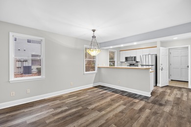 Located within Weehawka Woods in Pawleys Plantation, this condo on Pawleys Plantation Golf and Country Club in South Carolina - for sale on GolfHomes.com, golf home, golf lot