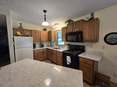 Located in Lake Carroll! Enjoy the privacy from the upper deck on Lake Carroll Golf Course in Illinois - for sale on GolfHomes.com, golf home, golf lot