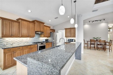 Shaded by the expansive canopy of a mature oak, the backyard is on Villages of Country Creek Golf Course in Florida - for sale on GolfHomes.com, golf home, golf lot