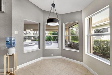 Shaded by the expansive canopy of a mature oak, the backyard is on Villages of Country Creek Golf Course in Florida - for sale on GolfHomes.com, golf home, golf lot