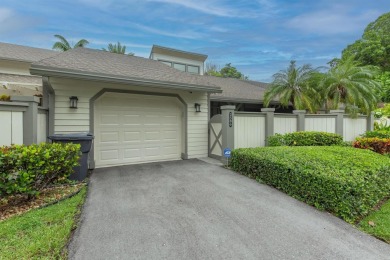 Nestled in the highly sought-after Bedford Mews neighborhood on Greenview Cove Golf Club in Florida - for sale on GolfHomes.com, golf home, golf lot