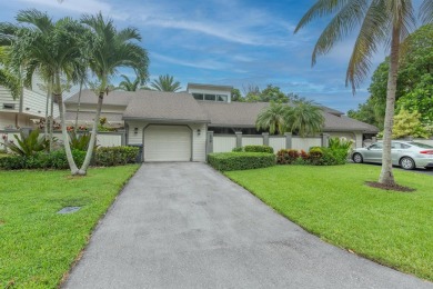 Nestled in the highly sought-after Bedford Mews neighborhood on Greenview Cove Golf Club in Florida - for sale on GolfHomes.com, golf home, golf lot