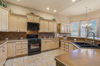 Southwest-style home in sought-after Sonoma Ranch featuring on Sonoma Ranch Golf Course in New Mexico - for sale on GolfHomes.com, golf home, golf lot