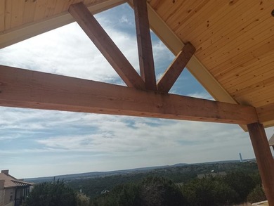 This rustic single story home at 105 Harbour Town Dr is located on The Cliffs Resort in Texas - for sale on GolfHomes.com, golf home, golf lot