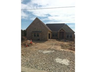 This rustic single story home at 105 Harbour Town Dr is located on The Cliffs Resort in Texas - for sale on GolfHomes.com, golf home, golf lot