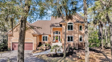 This lovely marshfront home is set back on over half an acre on The Seabrook Island Club in South Carolina - for sale on GolfHomes.com, golf home, golf lot