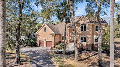 This lovely marshfront home is set back on over half an acre on The Seabrook Island Club in South Carolina - for sale on GolfHomes.com, golf home, golf lot