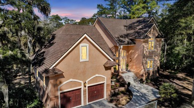 This lovely marshfront home is set back on over half an acre on The Seabrook Island Club in South Carolina - for sale on GolfHomes.com, golf home, golf lot