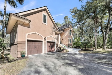 This lovely marshfront home is set back on over half an acre on The Seabrook Island Club in South Carolina - for sale on GolfHomes.com, golf home, golf lot