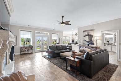 Situated in the gated Intracoastal Waterway community of The on Myrtlewood Golf Course and Club  in South Carolina - for sale on GolfHomes.com, golf home, golf lot