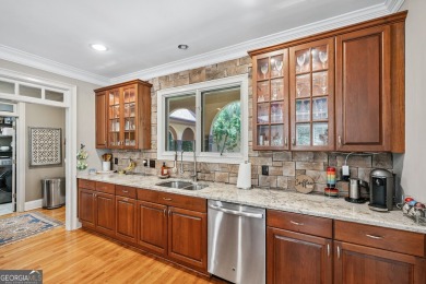 Welcome to a rare blend of luxury, comfort, and natural on Towne Lake Hills Golf Club in Georgia - for sale on GolfHomes.com, golf home, golf lot