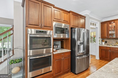 Welcome to a rare blend of luxury, comfort, and natural on Towne Lake Hills Golf Club in Georgia - for sale on GolfHomes.com, golf home, golf lot