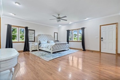 This exquisite custom home features breathtaking views of miles on Holiday Island Golf Course in Arkansas - for sale on GolfHomes.com, golf home, golf lot