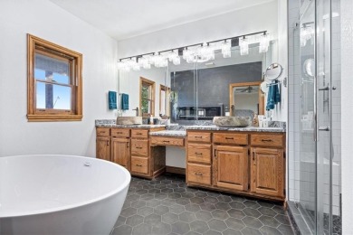 This exquisite custom home features breathtaking views of miles on Holiday Island Golf Course in Arkansas - for sale on GolfHomes.com, golf home, golf lot