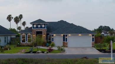 This stunning 3BR/2BA home offers a 2-car garage + a golf cart on South Padre Island Golf Club in Texas - for sale on GolfHomes.com, golf home, golf lot