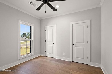 Gorgeous New Construction in Pinehurst of Lake Caroline! Come on Lake Caroline Golf Club in Mississippi - for sale on GolfHomes.com, golf home, golf lot