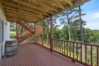 This exquisite custom home features breathtaking views of miles on Holiday Island Golf Course in Arkansas - for sale on GolfHomes.com, golf home, golf lot