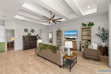 This stunning 3BR/2BA home offers a 2-car garage + a golf cart on South Padre Island Golf Club in Texas - for sale on GolfHomes.com, golf home, golf lot