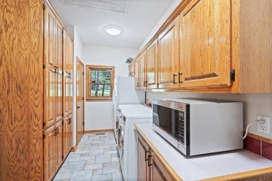 This exquisite custom home features breathtaking views of miles on Holiday Island Golf Course in Arkansas - for sale on GolfHomes.com, golf home, golf lot