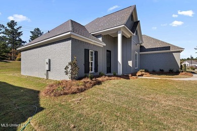 Gorgeous New Construction in Pinehurst of Lake Caroline! Come on Lake Caroline Golf Club in Mississippi - for sale on GolfHomes.com, golf home, golf lot