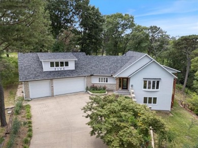 This exquisite custom home features breathtaking views of miles on Holiday Island Golf Course in Arkansas - for sale on GolfHomes.com, golf home, golf lot