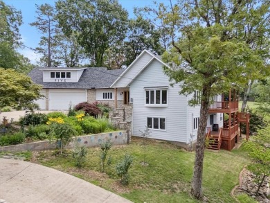 This exquisite custom home features breathtaking views of miles on Holiday Island Golf Course in Arkansas - for sale on GolfHomes.com, golf home, golf lot