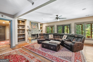 Welcome to a rare blend of luxury, comfort, and natural on Towne Lake Hills Golf Club in Georgia - for sale on GolfHomes.com, golf home, golf lot