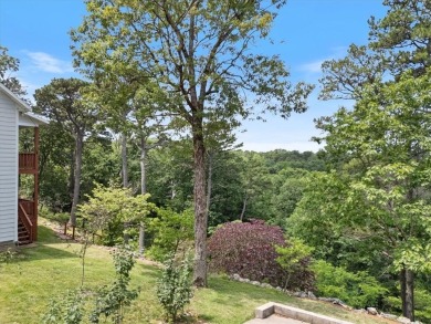This exquisite custom home features breathtaking views of miles on Holiday Island Golf Course in Arkansas - for sale on GolfHomes.com, golf home, golf lot
