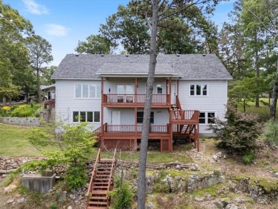 This exquisite custom home features breathtaking views of miles on Holiday Island Golf Course in Arkansas - for sale on GolfHomes.com, golf home, golf lot