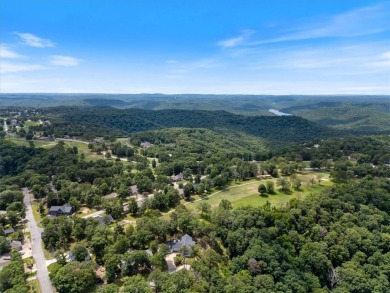 This exquisite custom home features breathtaking views of miles on Holiday Island Golf Course in Arkansas - for sale on GolfHomes.com, golf home, golf lot