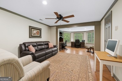 Welcome to a rare blend of luxury, comfort, and natural on Towne Lake Hills Golf Club in Georgia - for sale on GolfHomes.com, golf home, golf lot