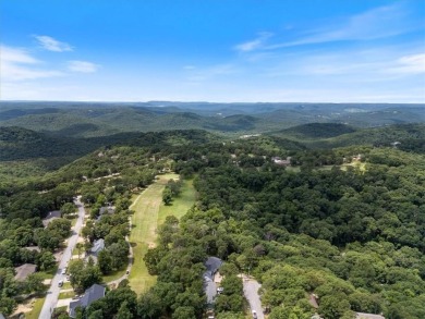 This exquisite custom home features breathtaking views of miles on Holiday Island Golf Course in Arkansas - for sale on GolfHomes.com, golf home, golf lot