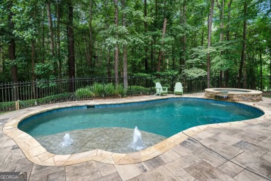 Welcome to a rare blend of luxury, comfort, and natural on Towne Lake Hills Golf Club in Georgia - for sale on GolfHomes.com, golf home, golf lot