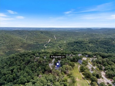This exquisite custom home features breathtaking views of miles on Holiday Island Golf Course in Arkansas - for sale on GolfHomes.com, golf home, golf lot