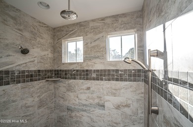 This is your perfect alternative to dealing with the headaches on Ocean Ridge Plantation in North Carolina - for sale on GolfHomes.com, golf home, golf lot