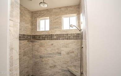 This is your perfect alternative to dealing with the headaches on Ocean Ridge Plantation in North Carolina - for sale on GolfHomes.com, golf home, golf lot