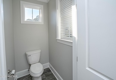 This is your perfect alternative to dealing with the headaches on Ocean Ridge Plantation in North Carolina - for sale on GolfHomes.com, golf home, golf lot