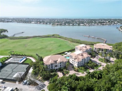 Experience luxury, coastal Florida living at its finest in this on Windstar on Naples Bay in Florida - for sale on GolfHomes.com, golf home, golf lot