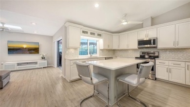 Tucked away among mature trees and lush landscaping, this on IMG Academies Golf and Country Club in Florida - for sale on GolfHomes.com, golf home, golf lot