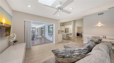 Tucked away among mature trees and lush landscaping, this on IMG Academies Golf and Country Club in Florida - for sale on GolfHomes.com, golf home, golf lot