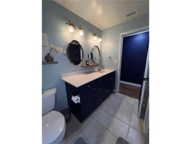 Welcome to your dream home at 6765 Overlook Drive, nestled in on Cypress Lake Country Club in Florida - for sale on GolfHomes.com, golf home, golf lot