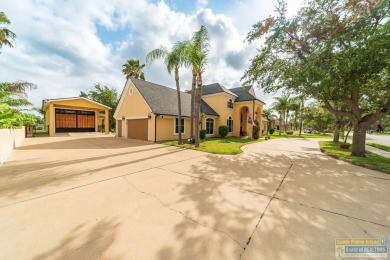 Tucked along the fairway in Rancho Escondido, this 4,037 sq ft on Rancho Viejo Resort and Country Club in Texas - for sale on GolfHomes.com, golf home, golf lot