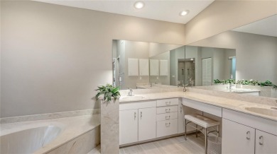 Tucked away among mature trees and lush landscaping, this on IMG Academies Golf and Country Club in Florida - for sale on GolfHomes.com, golf home, golf lot
