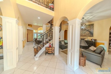 Tucked along the fairway in Rancho Escondido, this 4,037 sq ft on Rancho Viejo Resort and Country Club in Texas - for sale on GolfHomes.com, golf home, golf lot