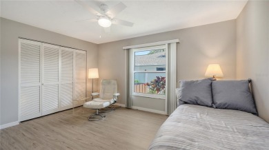 Tucked away among mature trees and lush landscaping, this on IMG Academies Golf and Country Club in Florida - for sale on GolfHomes.com, golf home, golf lot