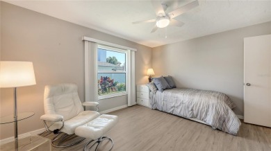 Tucked away among mature trees and lush landscaping, this on IMG Academies Golf and Country Club in Florida - for sale on GolfHomes.com, golf home, golf lot