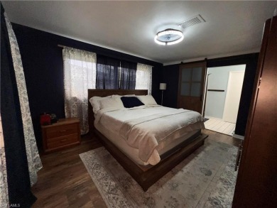 Welcome to your dream home at 6765 Overlook Drive, nestled in on Cypress Lake Country Club in Florida - for sale on GolfHomes.com, golf home, golf lot